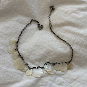 Cookie Lee Silvertone Necklace with mother of pearl paillettes